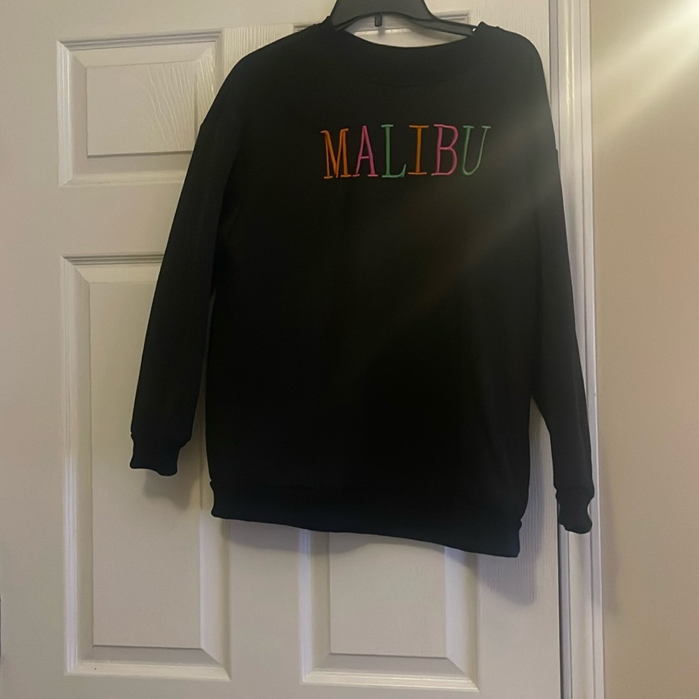 Black malibu sweater